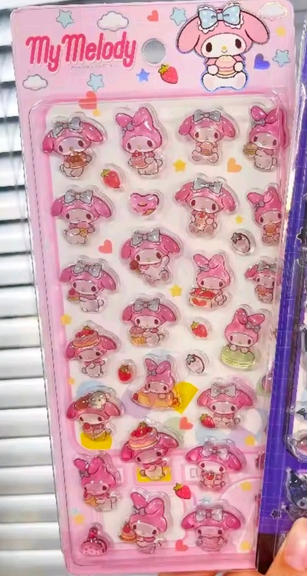My Melody puffy sticker sheet with pink cartoon outfits and bunny details