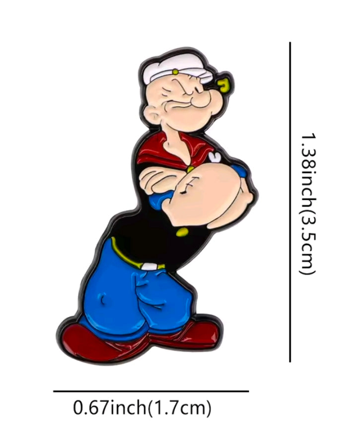 Cartoon sailor enamel lapel pin, red shirt, blue pants, black outline.