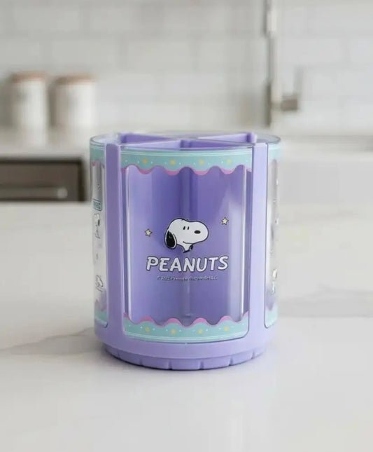 Purple acrylic Peanuts spinning pen holder, Snoopy logo on front panel