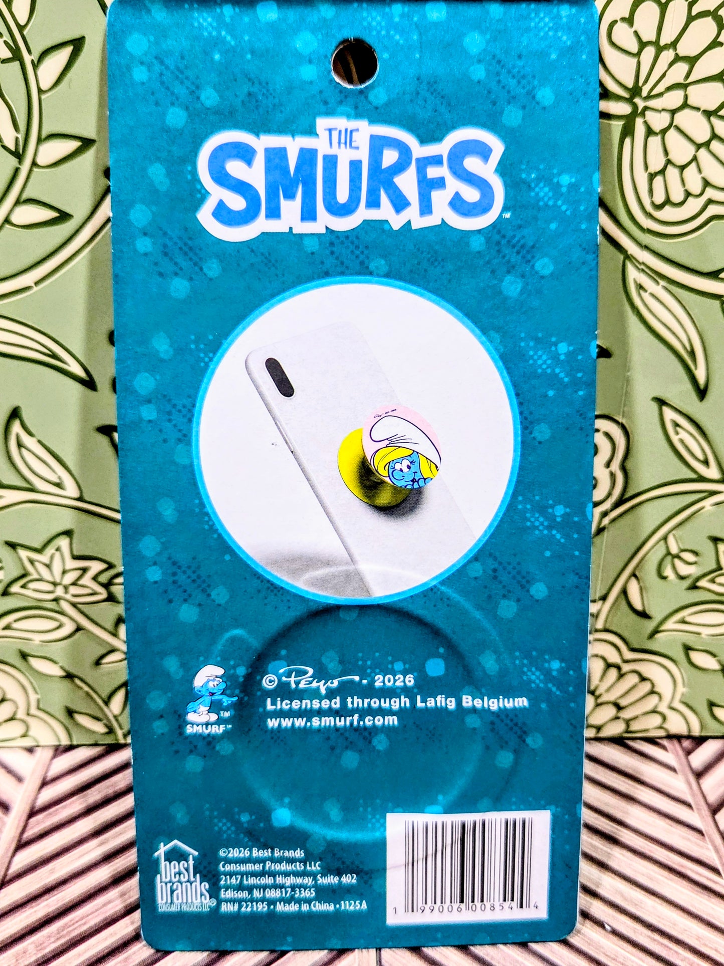 Smurf phone grip holder back card with circular artwork and barcode
