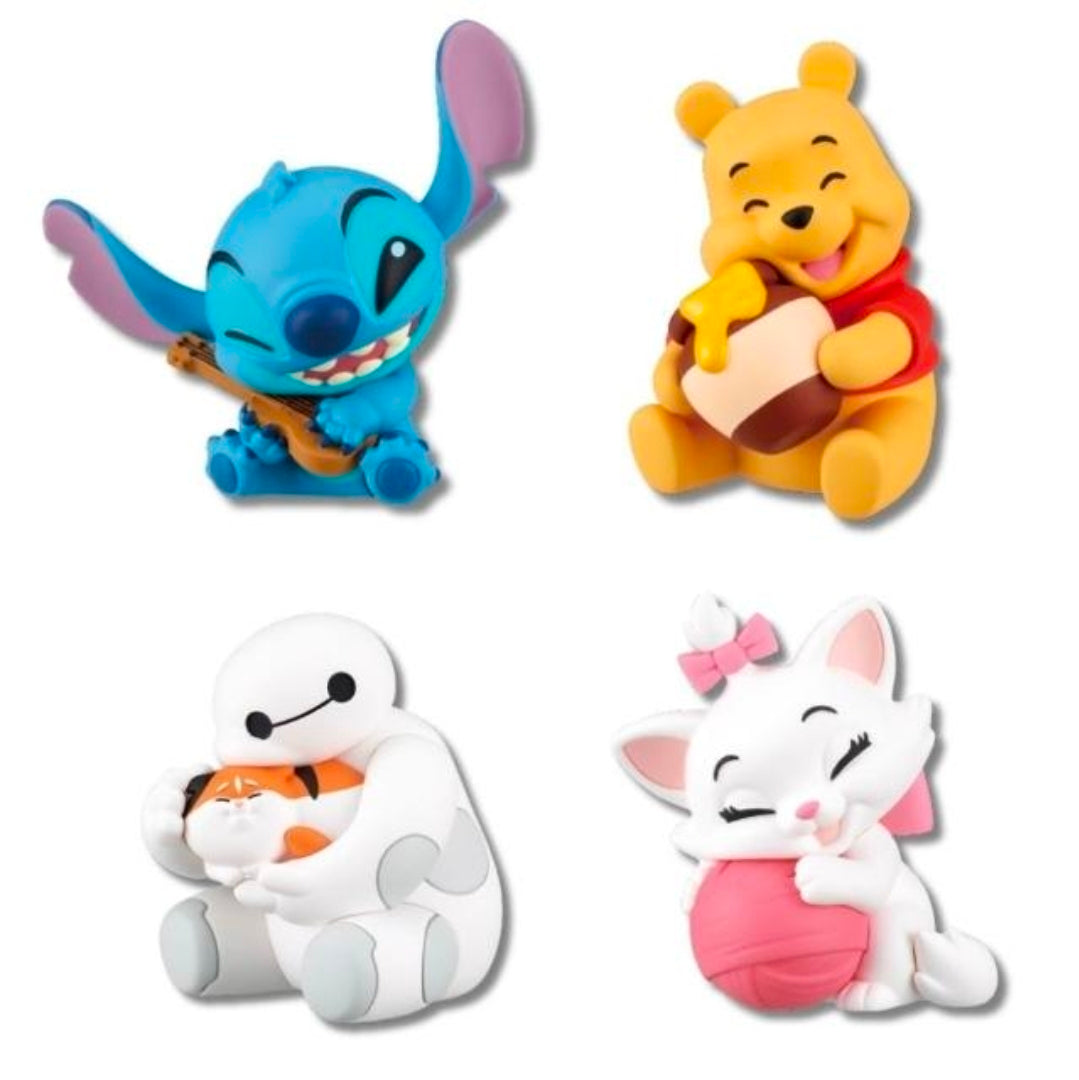 Set of four Disney plush figures: Stitch, Winnie the Pooh, a white robot, and Marie the cat