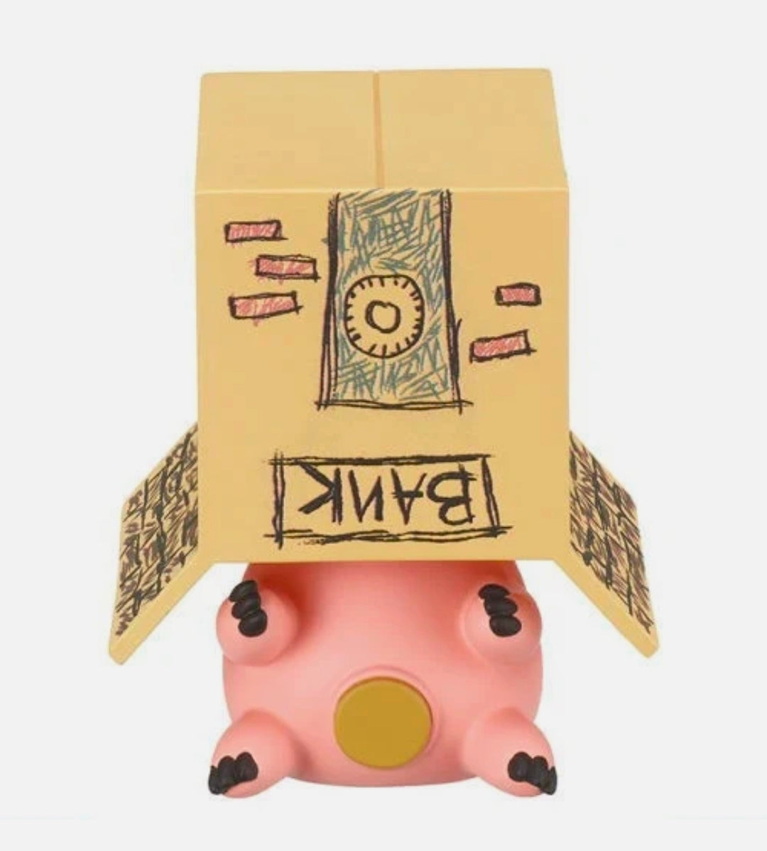Pink pig gashapon figure with black spots and yellow snout