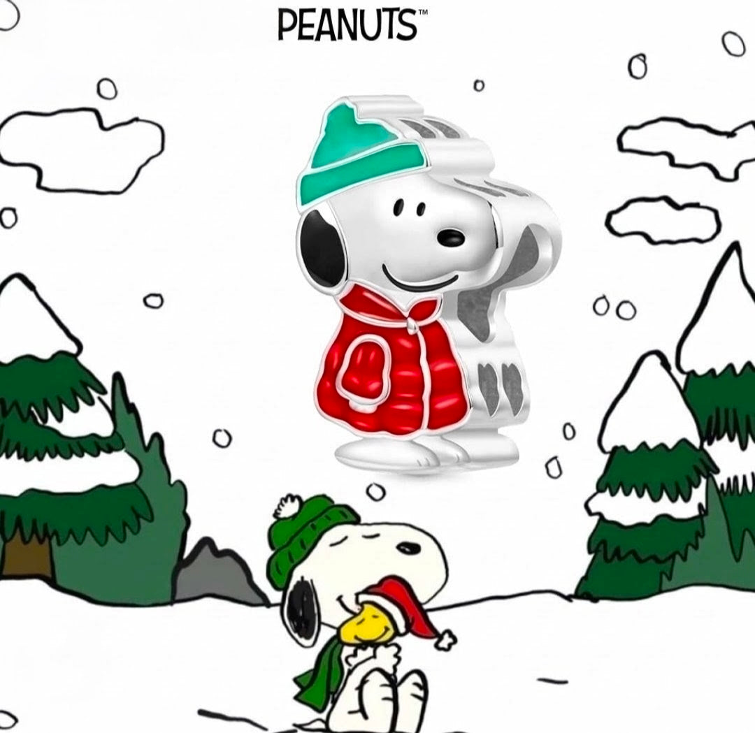 Sterling silver Snoopy winter puffer coat charm with green hat, red coat, and enamel detail