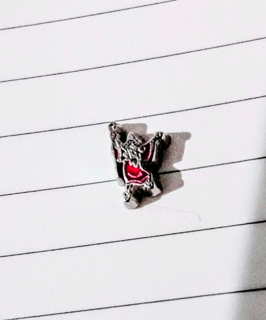 Character floating charm: black dog figure with red collar on round silver base