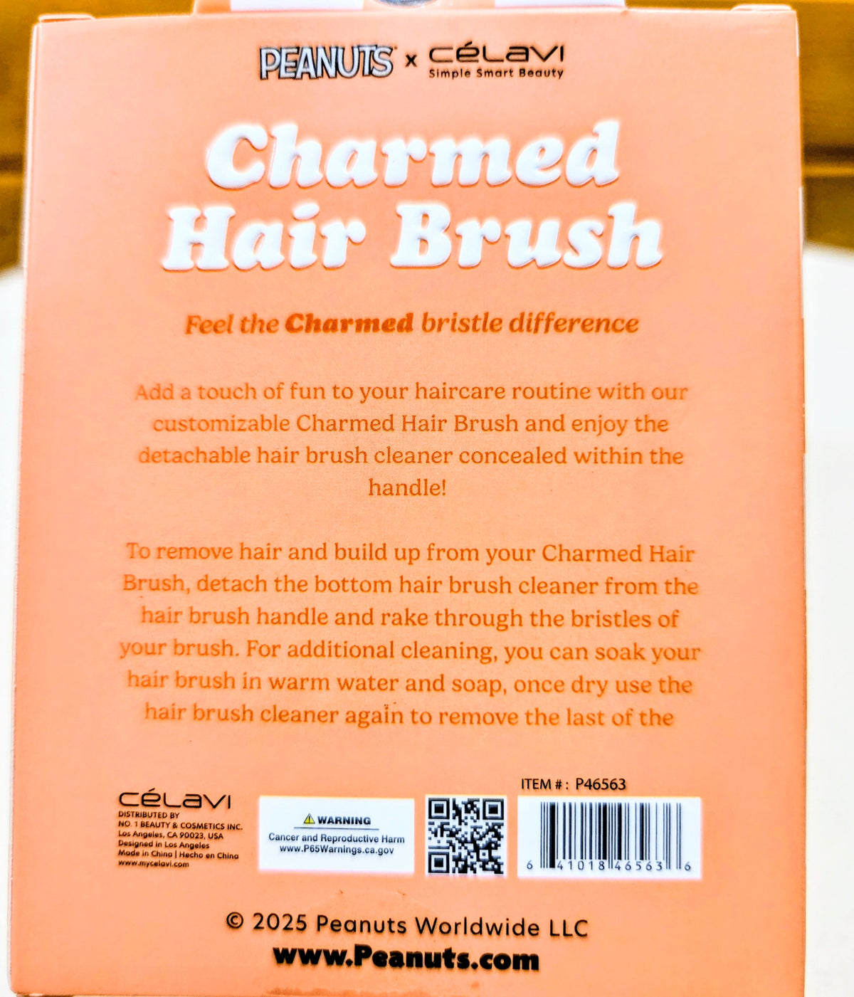 Peanuts x Celavi charmed hair brush box front with product name and instructions
