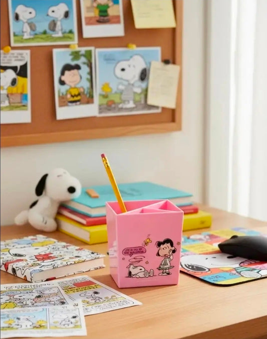 Pink 3-compartment pen holder desk organizer with Peanuts character illustration on front