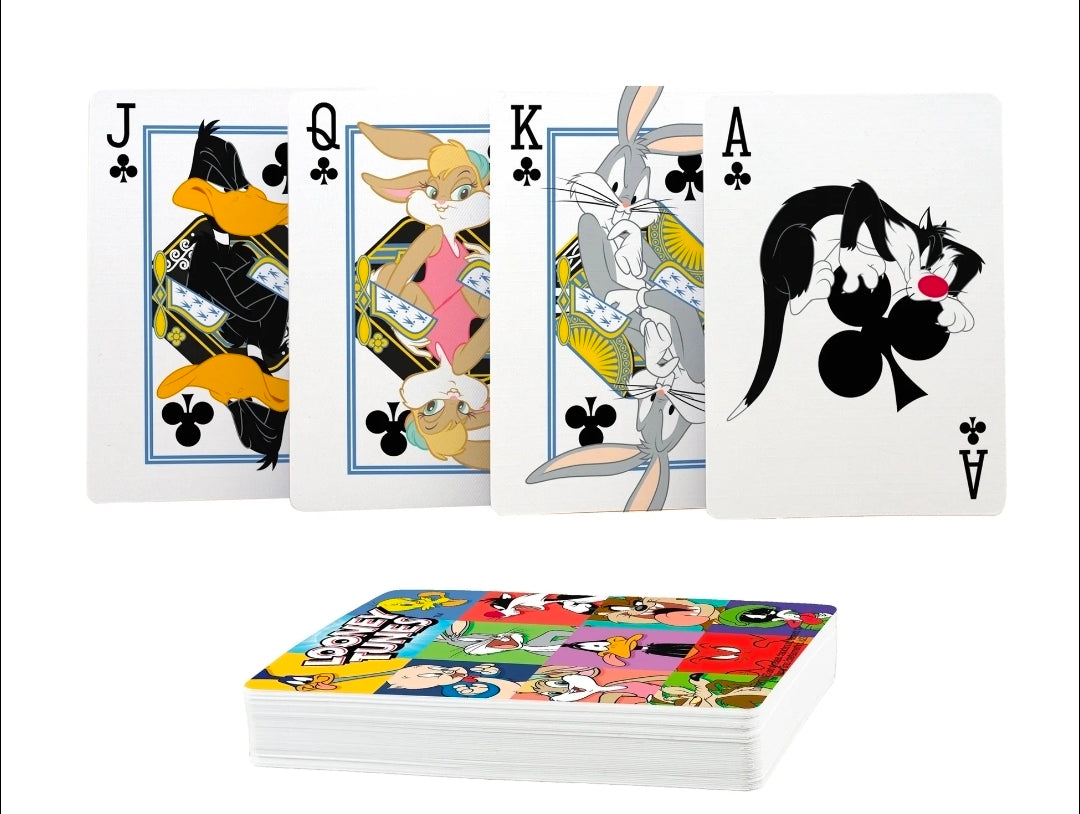 Looney Tunes playing cards spread with four suit faces and character silhouettes