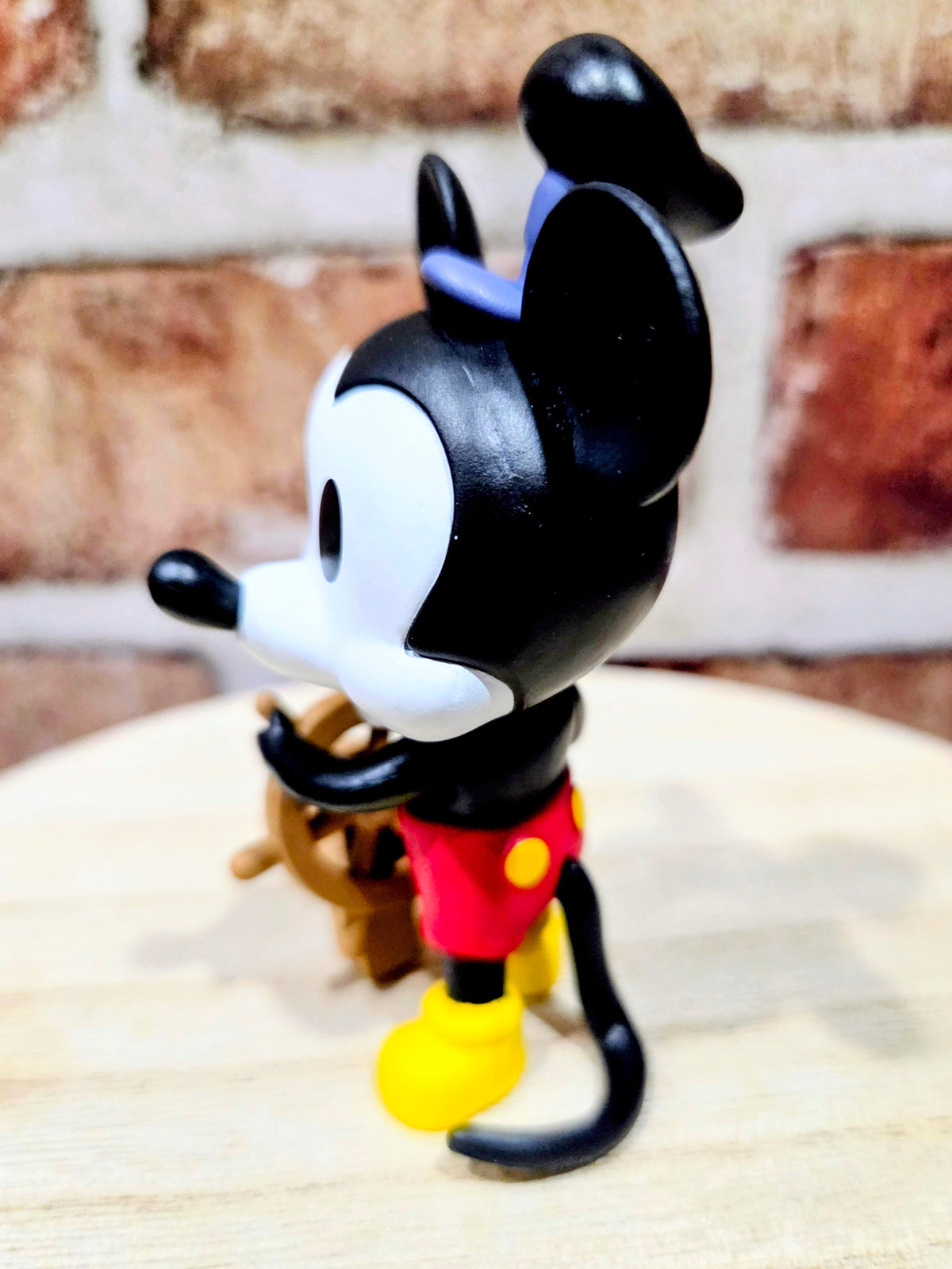 Mickey Mouse mini vinyl figure in red shirt and yellow shoes, standing pose