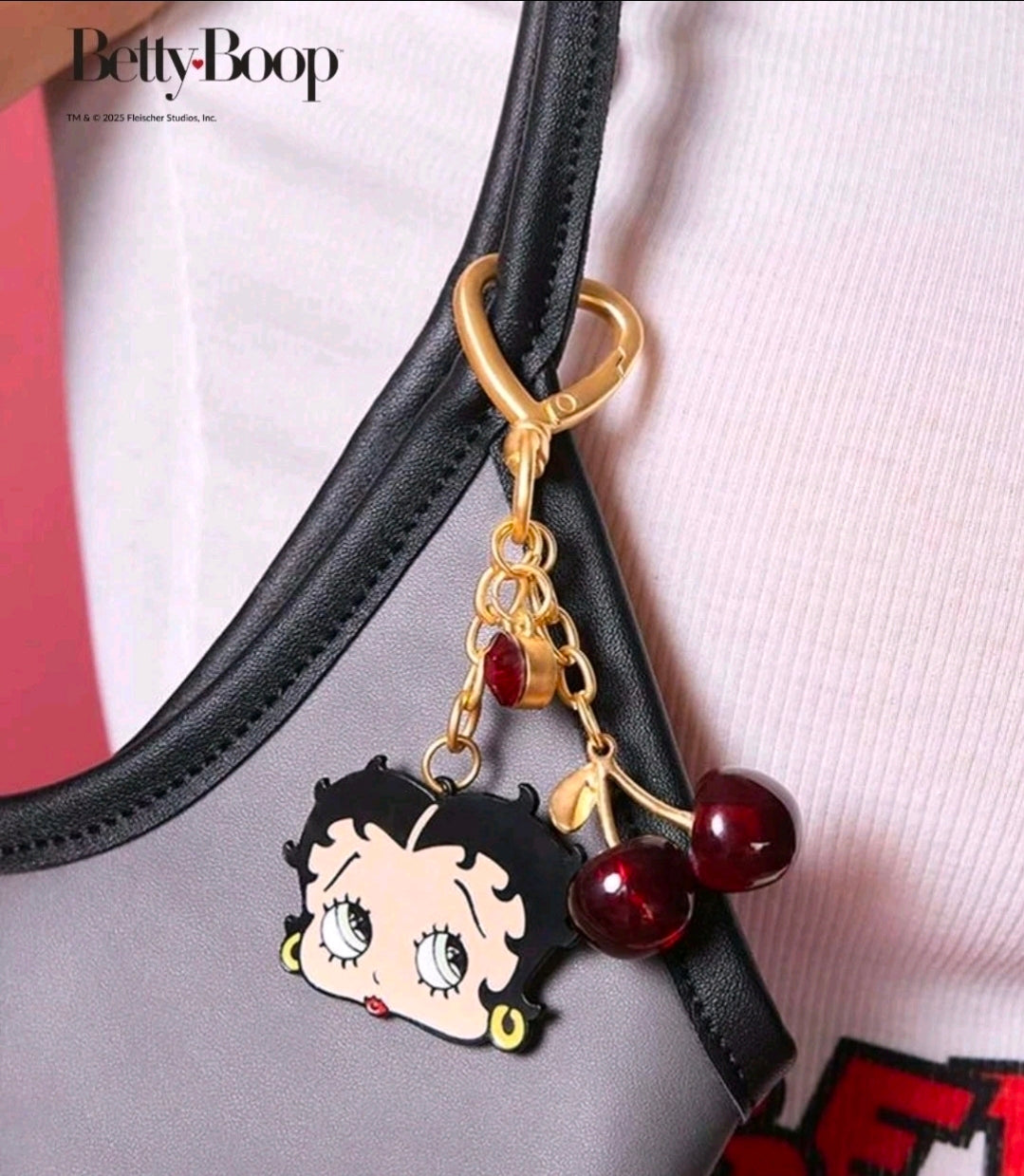 Betty Boop bag charm on gold chain with red cherry bead and heart accents