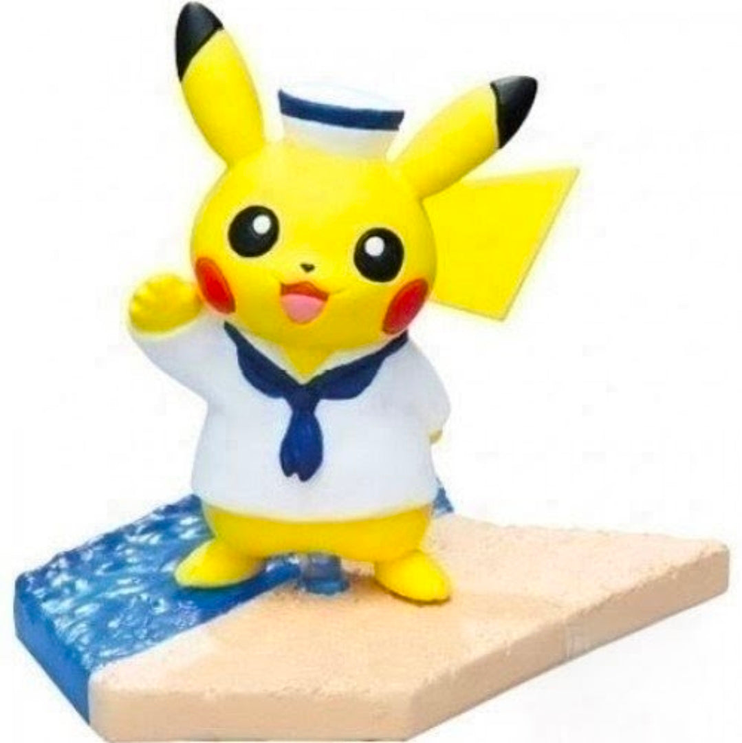 Close-up sailor-outfitted yellow Pikachu seaside mini figure seated on blue water base