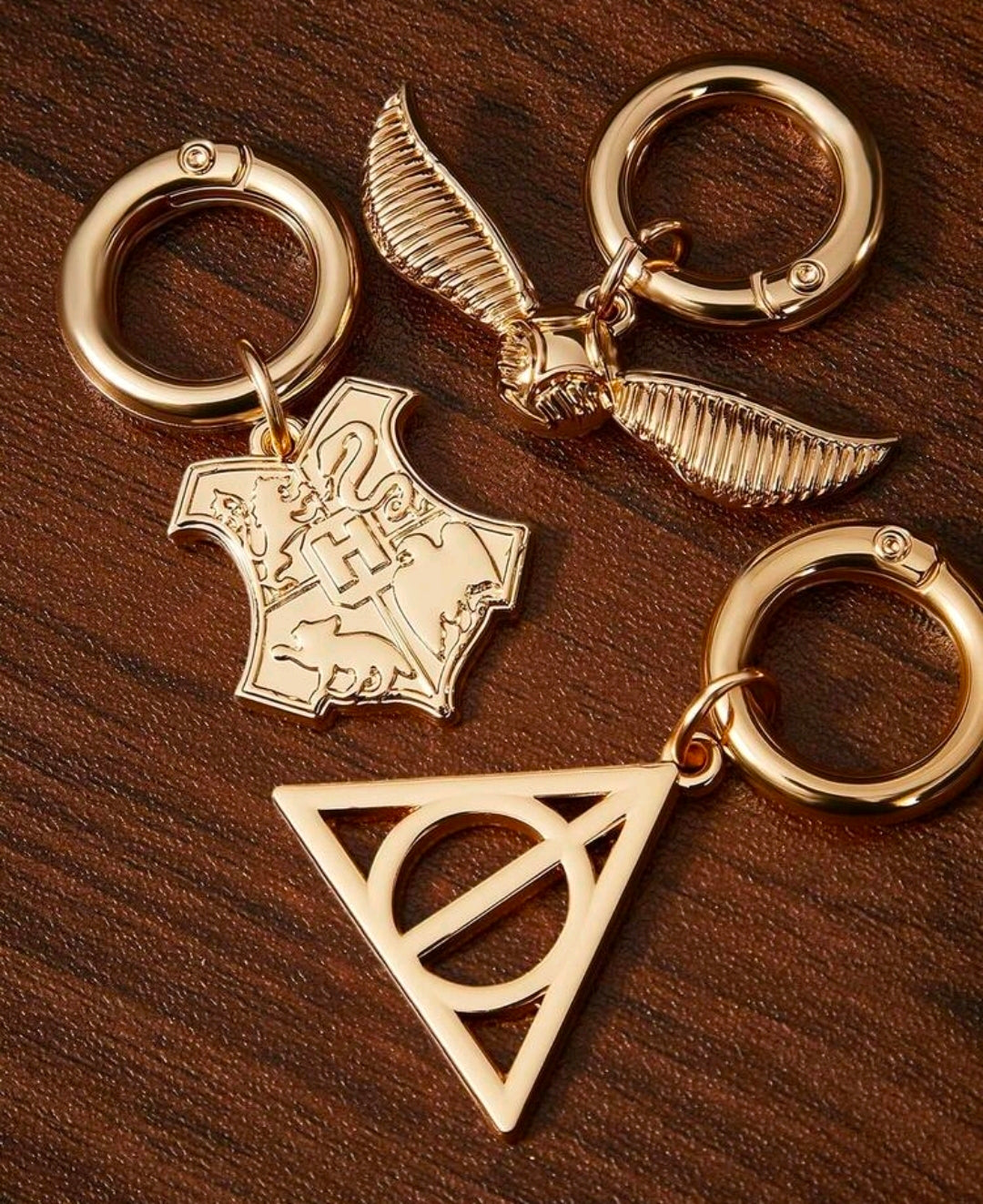 Harry Potter 3 Piece Gold Bag Charm Set Snitch Hogwarts Deathly