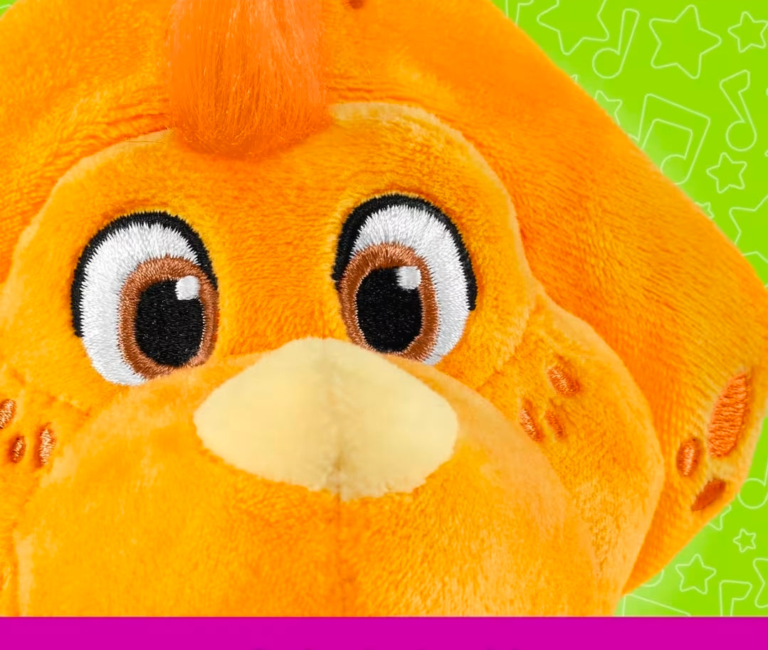Orange plush dinosaur head with big embroidered eyes and beige snout, close-up