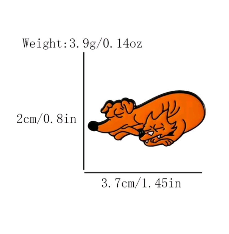 Orange curled monster enamel pin with black facial details
