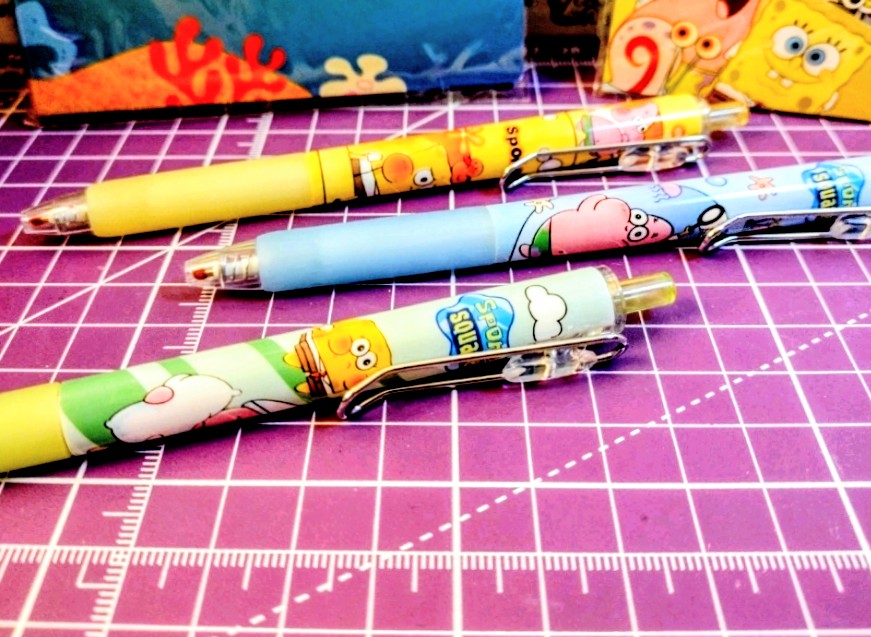 SpongeBob chibi pens, three colorful cartoon ballpoint-style pencils with clips