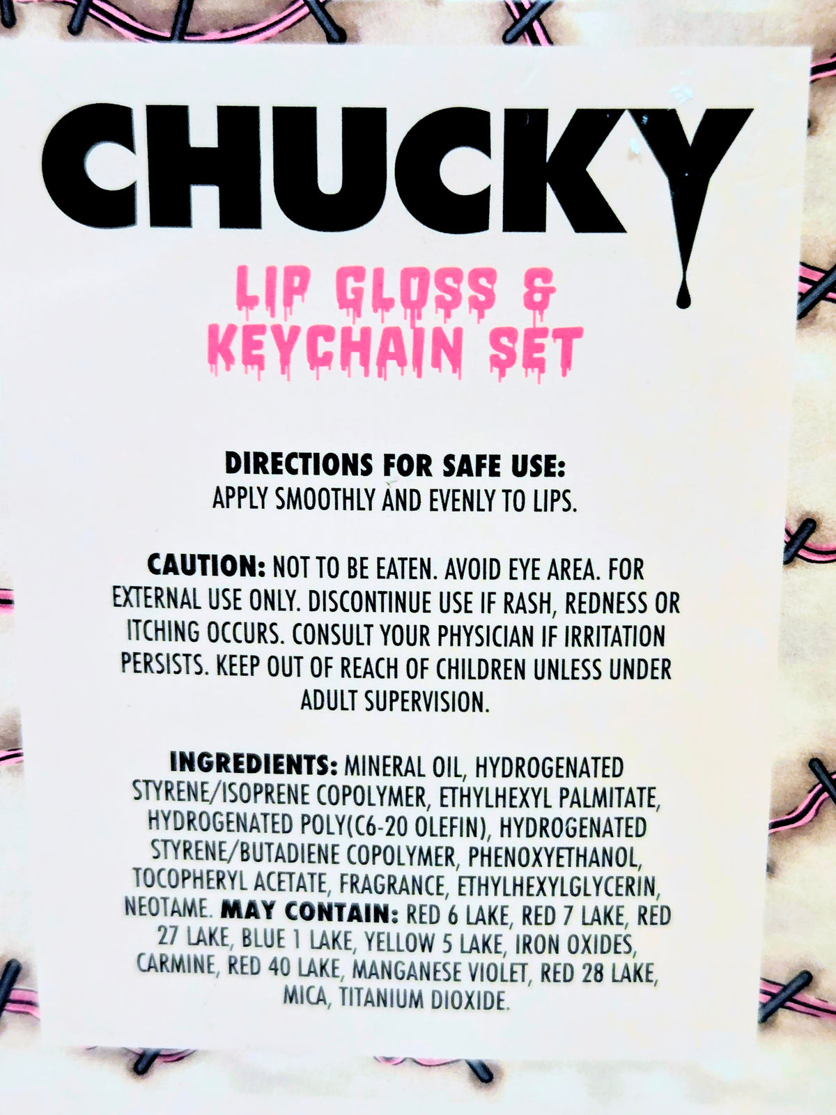 Chucky lip gloss and keychain gift set directions and ingredients card