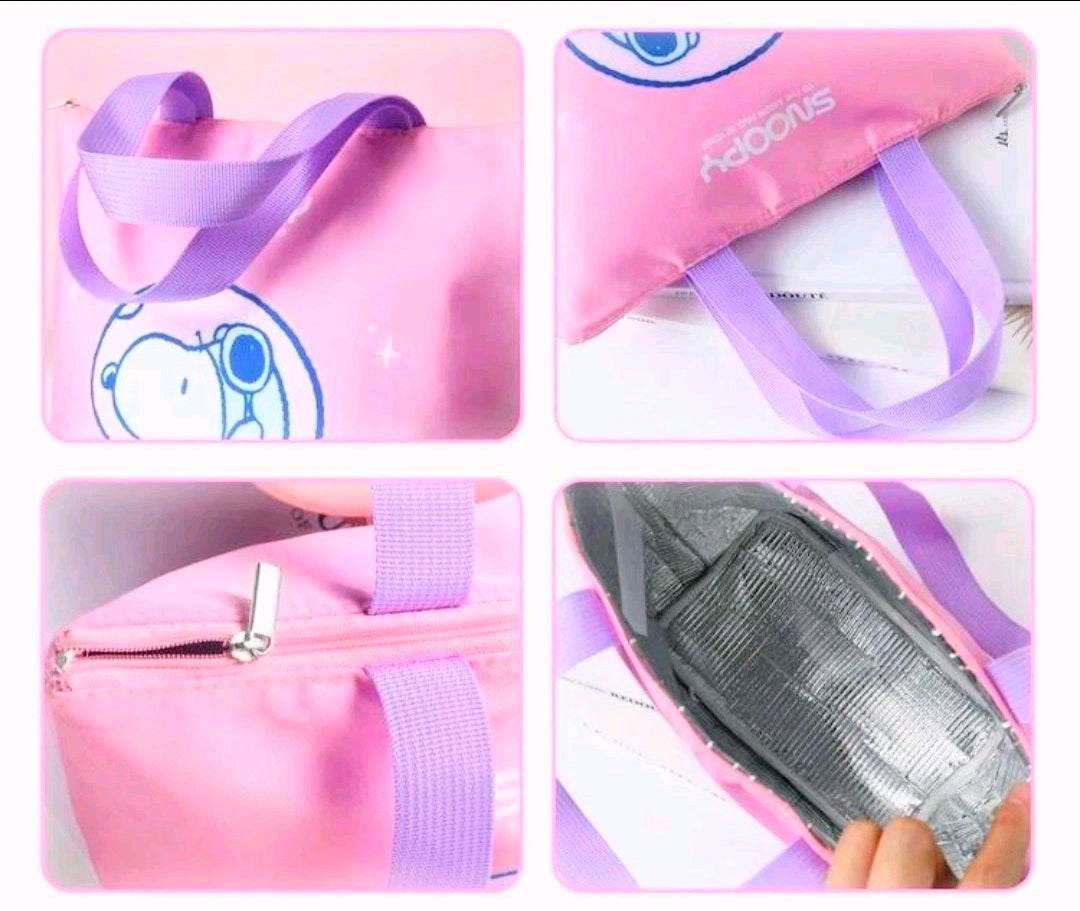 Pink insulated lunch bag shown with purple strap and open silver-lined interior