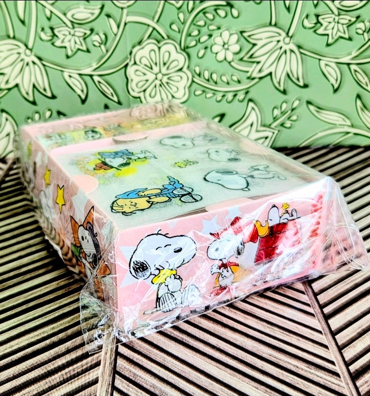 Peanuts Snoopy sticker sheets and washi tape gift set in pink box, characters visible