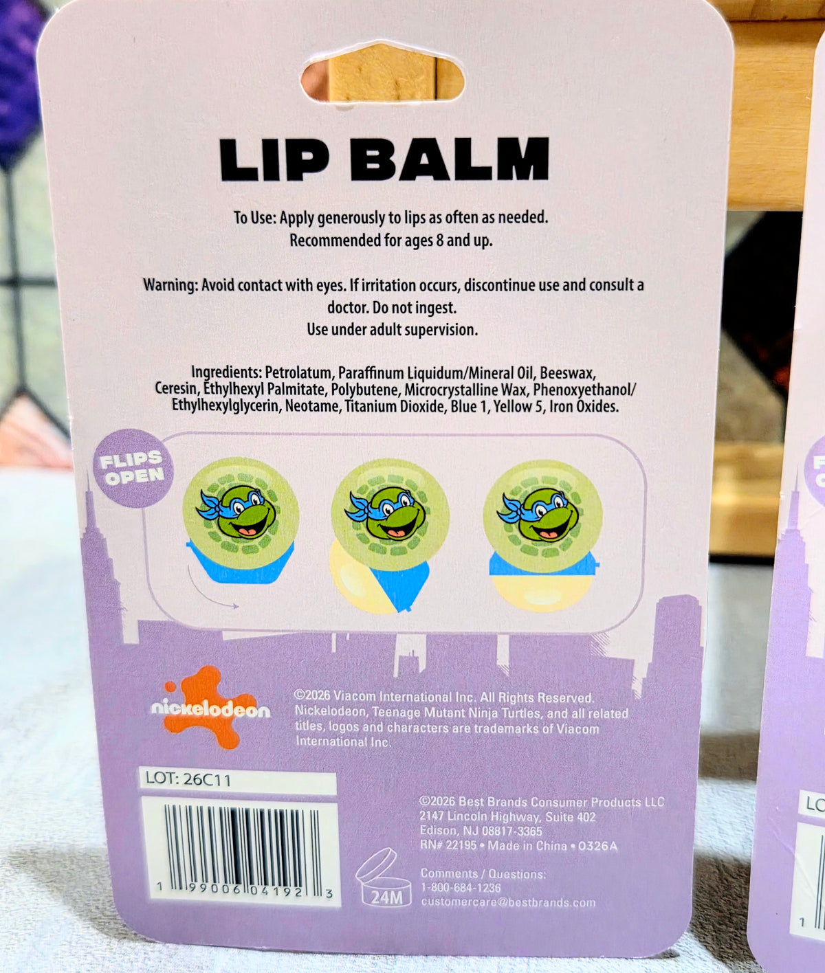 Lip balm blister card with bold title and Teen Age Mutant Ninja Turtles icons