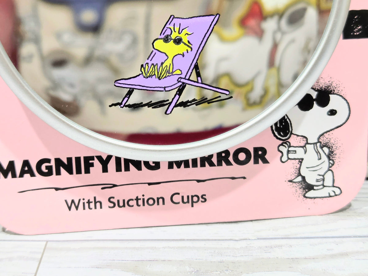 Magnifying mirror with suction cups, Snoopy graphic and purple 'Woke Up This Cute!'