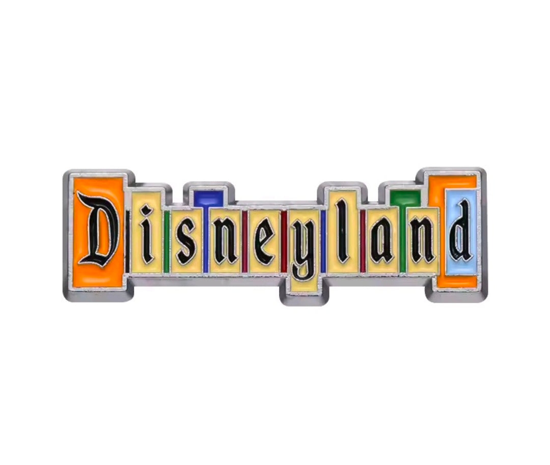 Enamel DisneyLand logo pin with orange and blue enamel blocks and raised metal outline.
