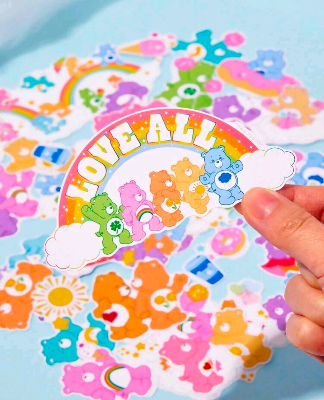 Rainbow “Over All” vinyl decal sticker with multiple bear characters around it