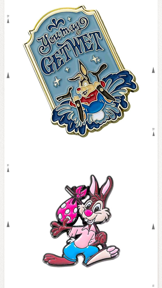 Two enamel lapel pins: blue “Get Wet” sign and Br’er Rabbit character