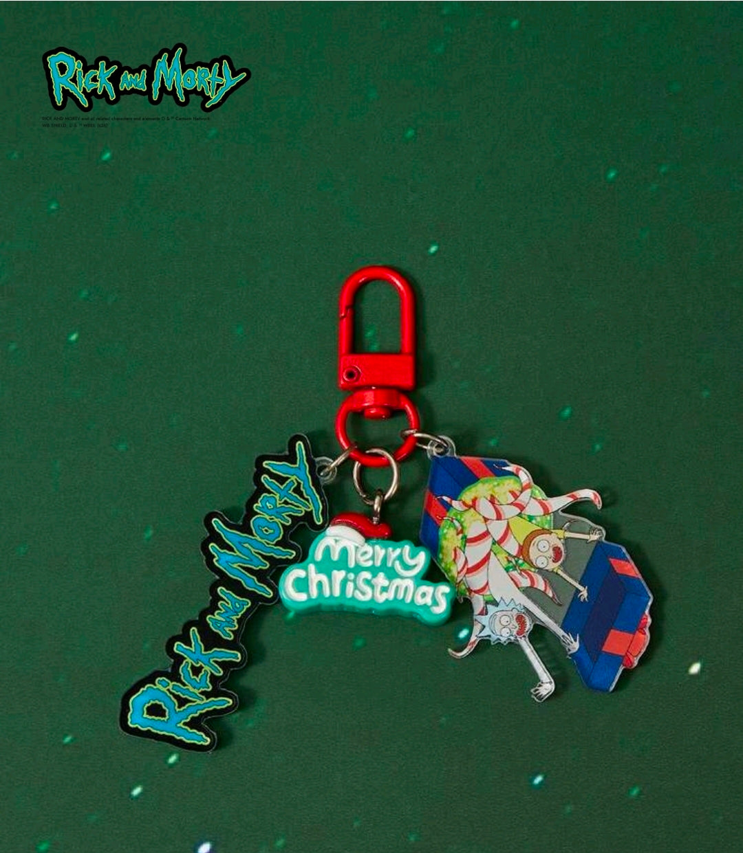 Red carabiner keyring with Rick script charm, Merry Christmas tag, and multicolor Santa elf