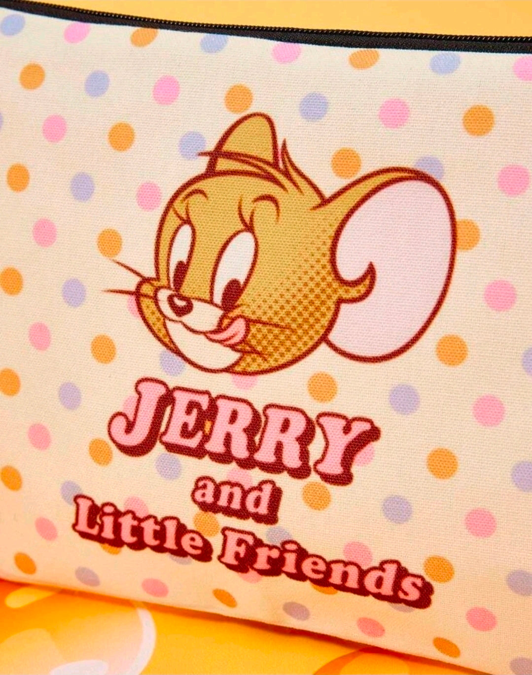 White polka-dot zipper pouch with Jerry and Little Friends graphic