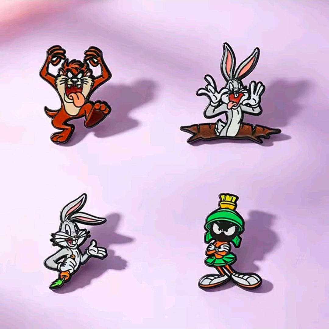 Looney Tunes enamel pin set (4 pcs) shown as four colorful character pins
