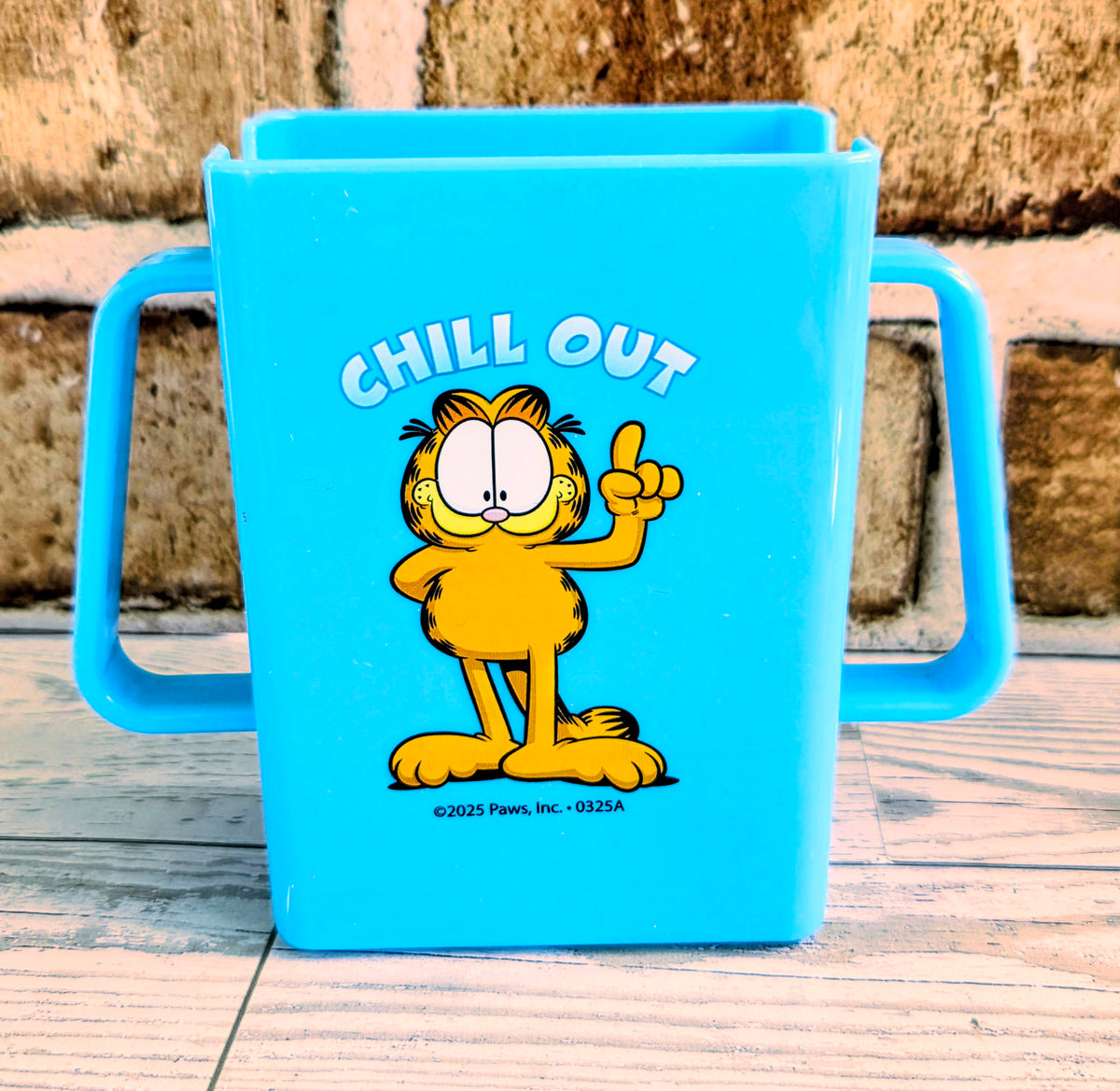 Blue Garfield “Chill Out” juice box holder with cartoon Garfield illustration