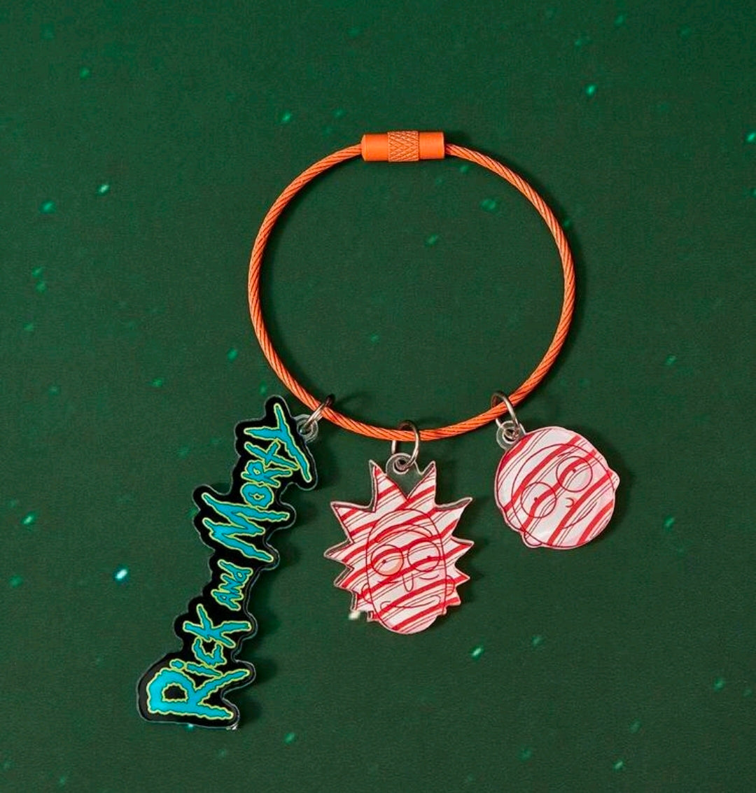 Orange braided wire keyring with blue name charm and red portal and head acrylic charms