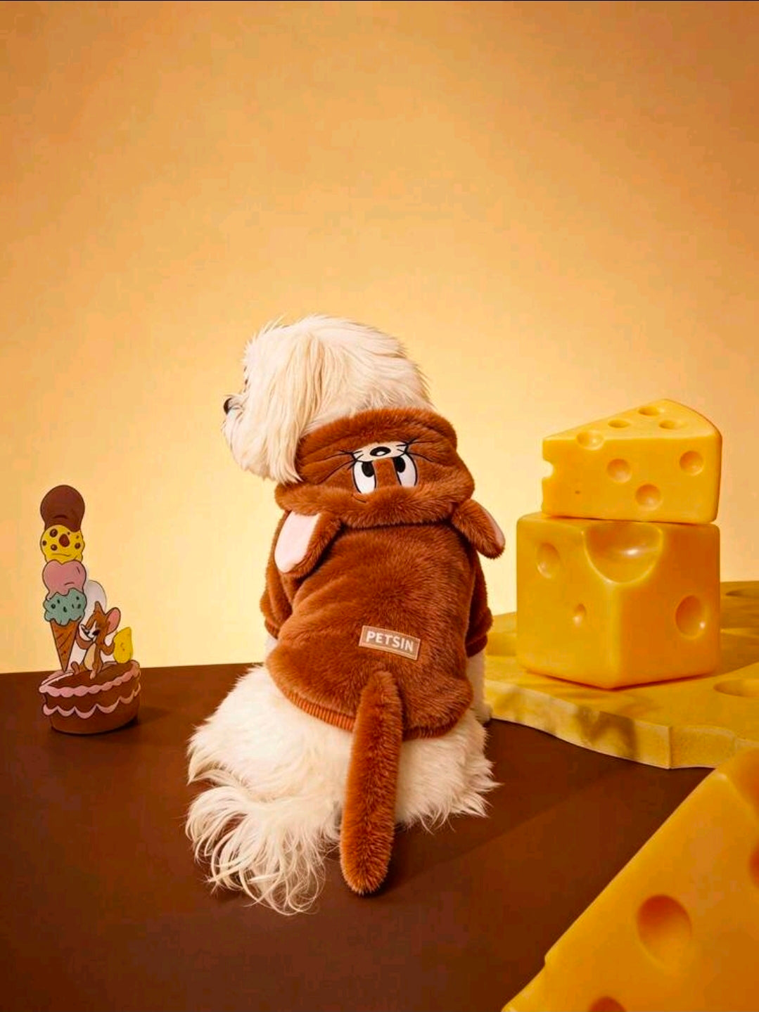Brown mouse plush hoodie on white dog, hood up with cartoon face detail