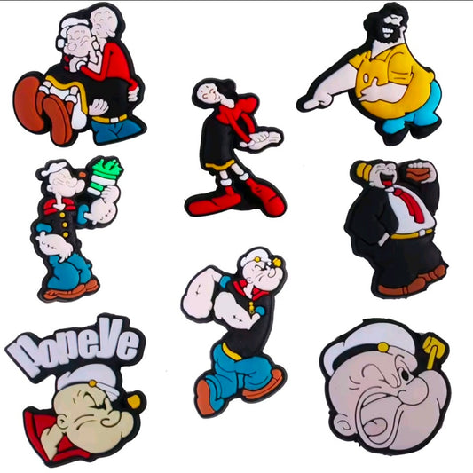 PVC shoe bag charm set with multiple Popeye character charms in varied full-body poses
