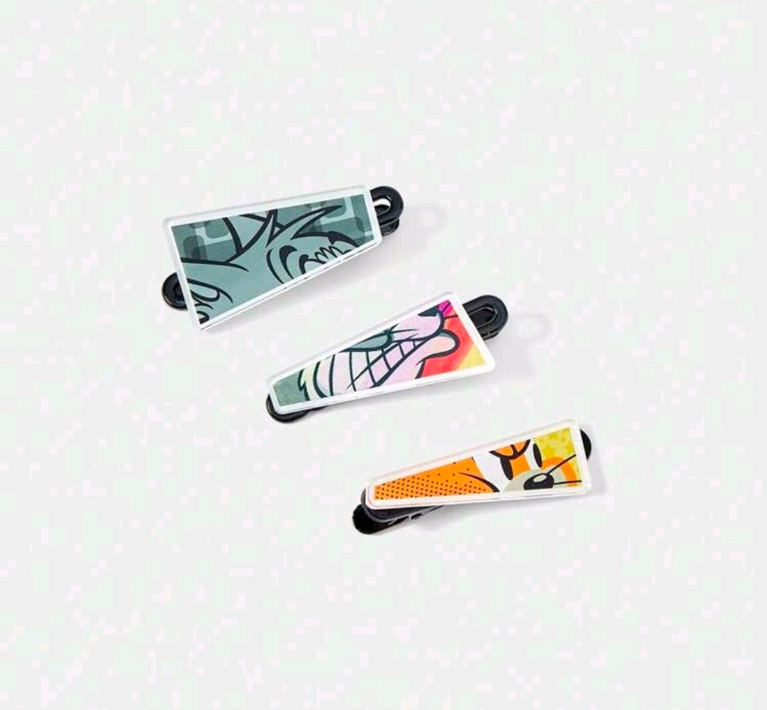 Satin hair clips set with three Tom & Jerry character print panels, black clasps