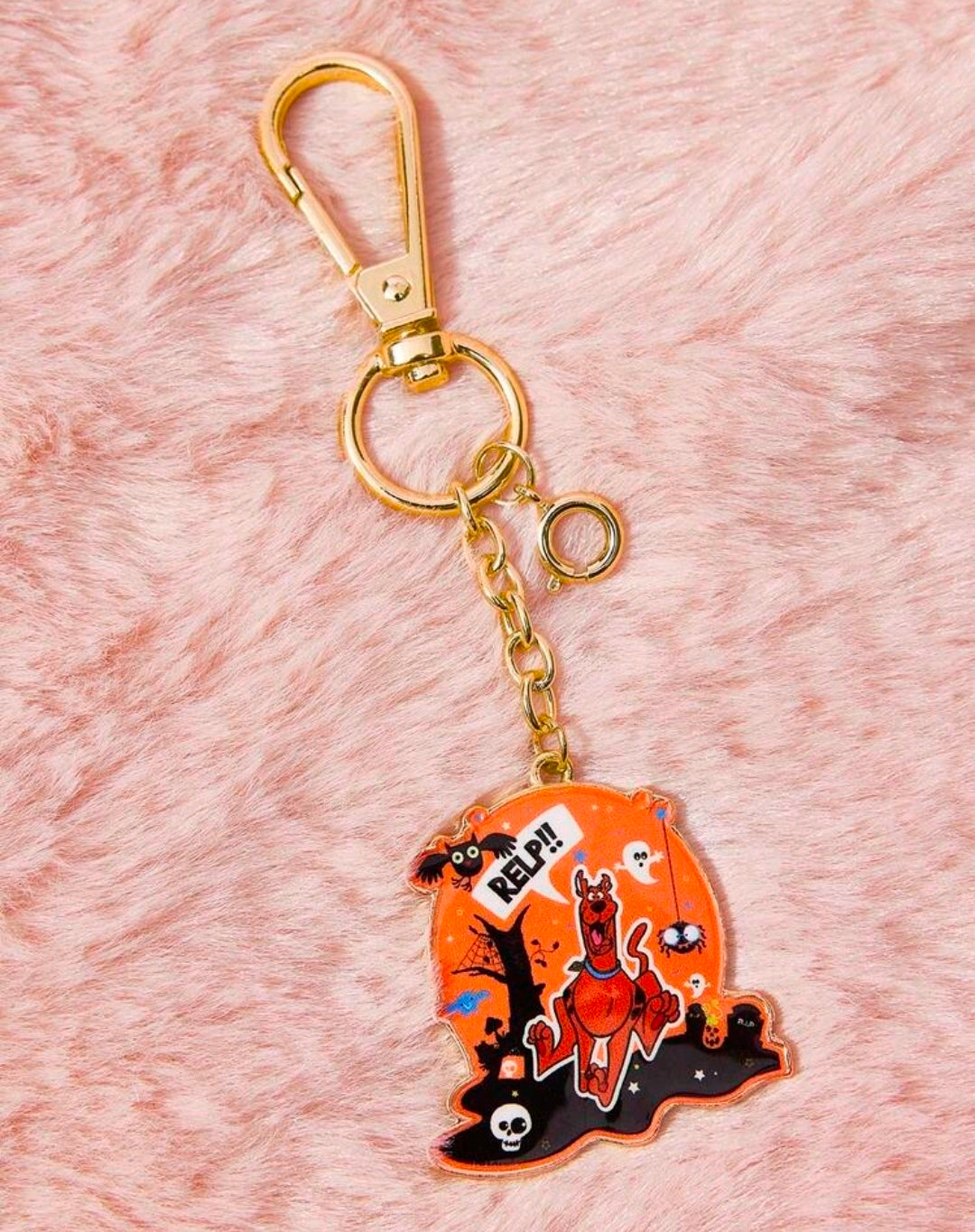 Gold-tone enamel keychain with orange Halloween Scooby-Doo character charm on chain