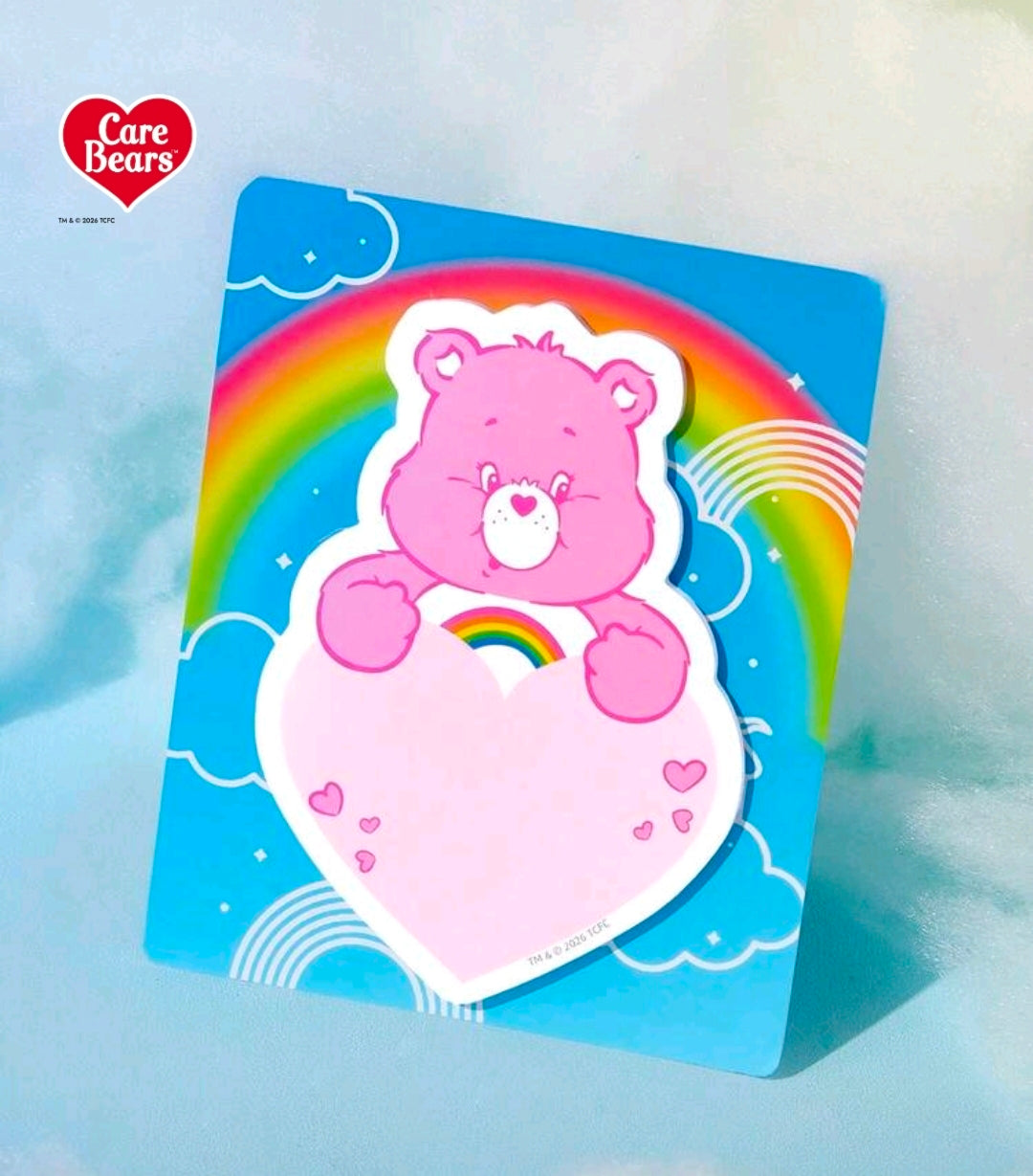Care Bears heart-shaped sticky note pad with pink bear die-cut in rainbows