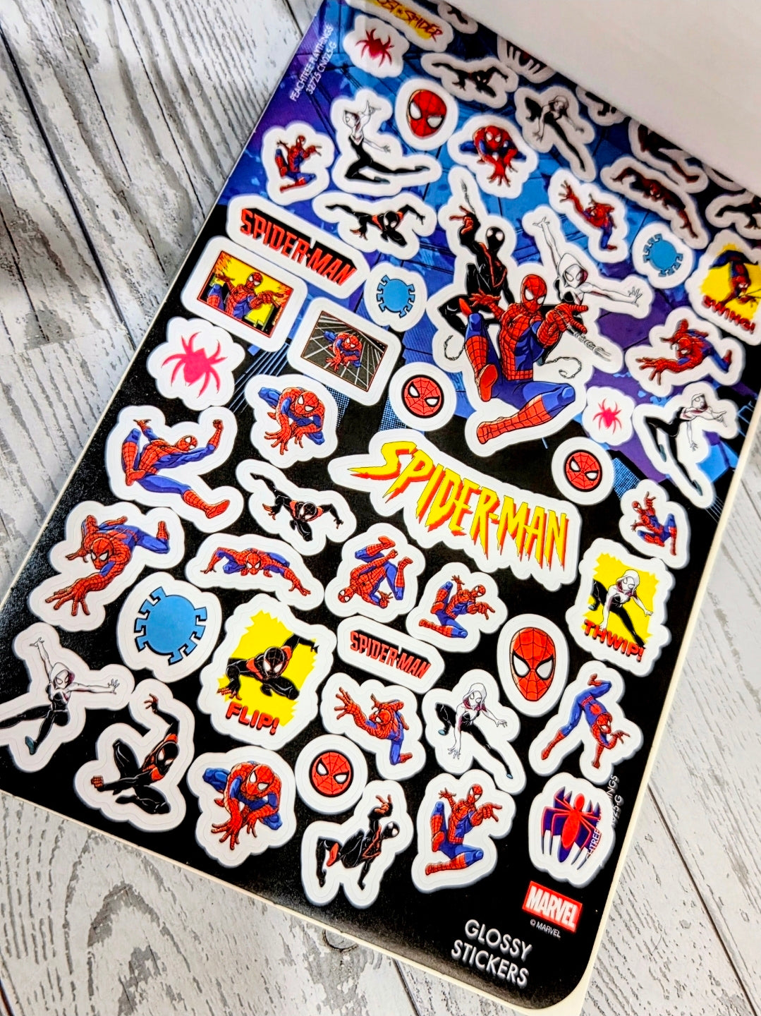 Spider-Man glossy sticker sheet with many cartoon character decals