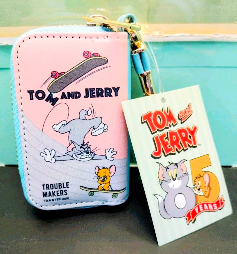 Pink Tom and Jerry smart key case with Trouble Makers graphic and skateboard