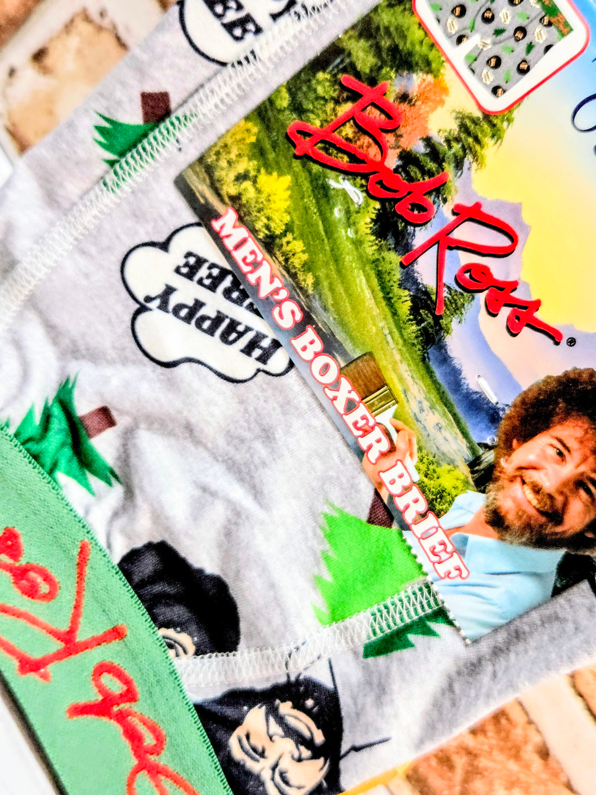 Men's boxer briefs and socks set; gray fabric with painting scene and green trees