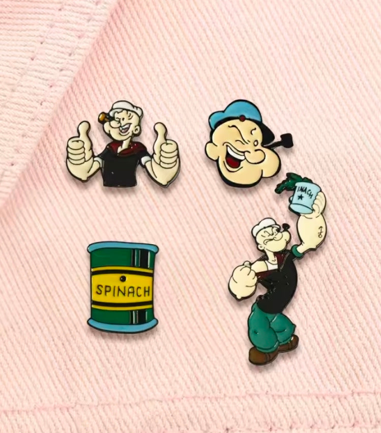 Four-piece Popeye enamel lapel pin set: two character pins and a spinach can pin