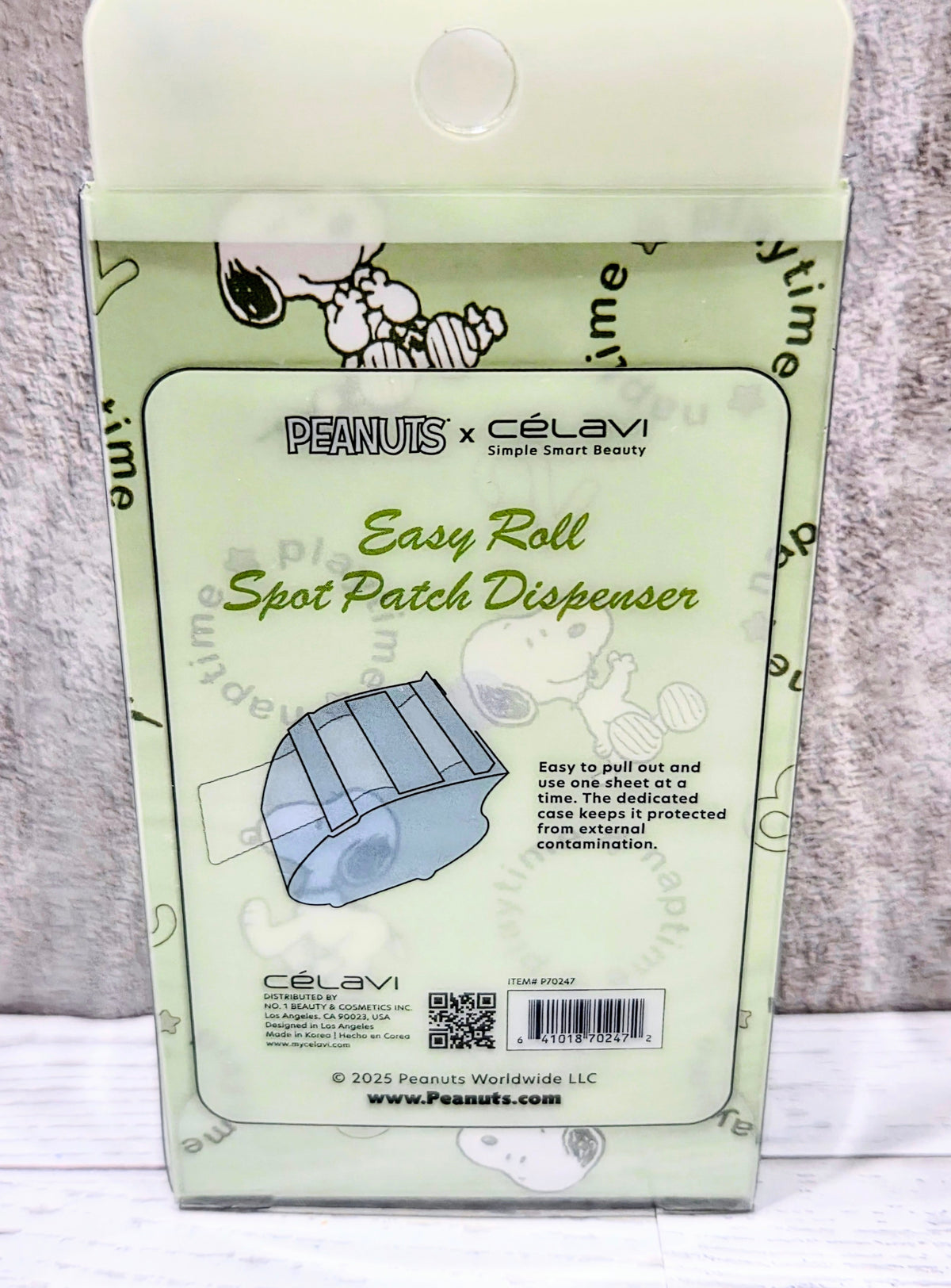Peanuts x Celavi Easy Roll Spot Patch Dispenser in lime green, Snoopy front panel