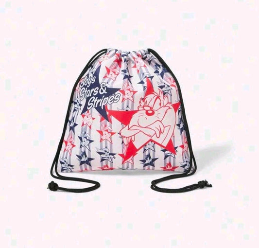 Looney Tunes Taz stars-and-stripes drawstring bag with black cords, white/red/blue patriotic print