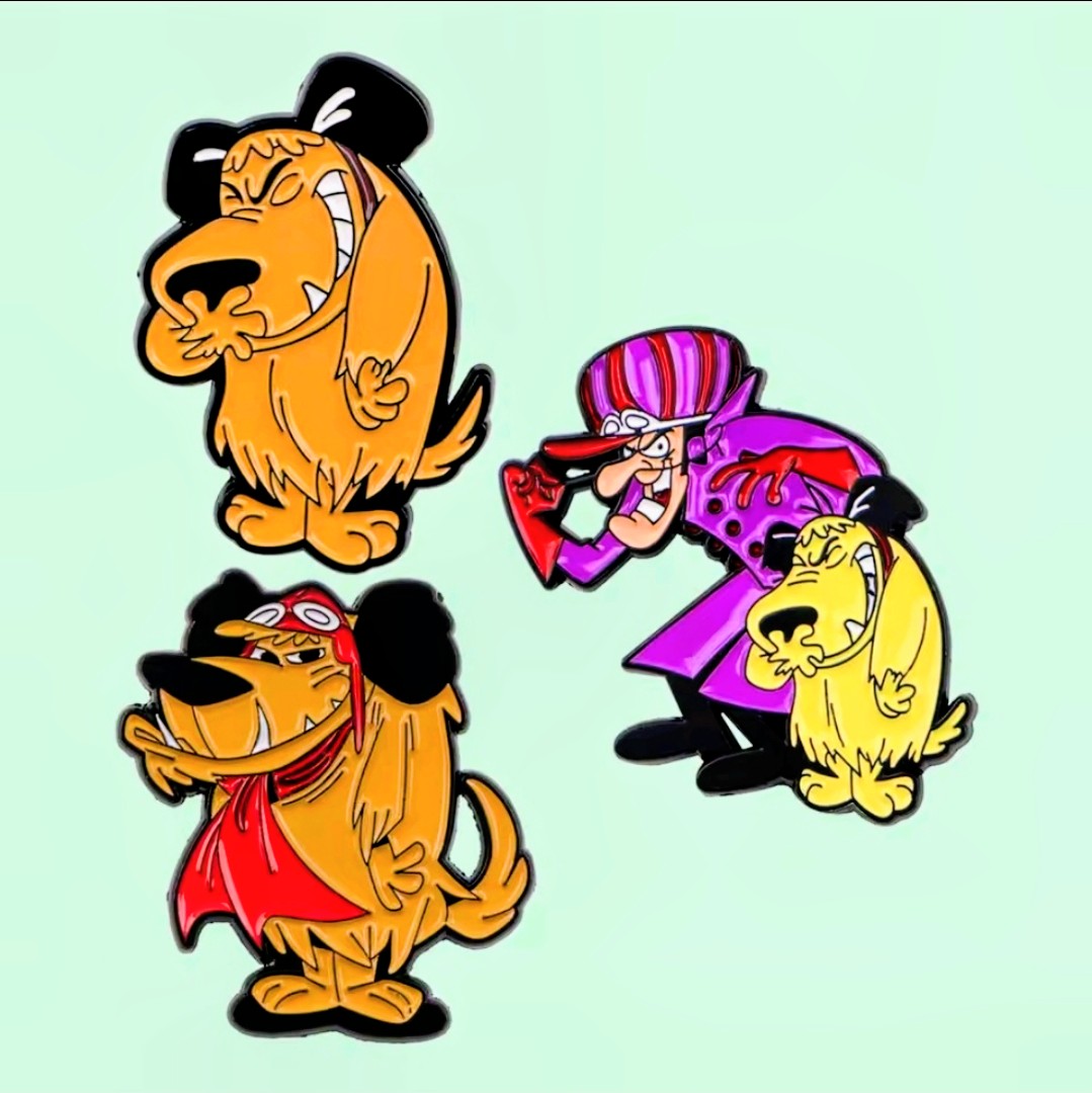 Three character enamel pins: orange dog, red shirt dog, purple striped dog