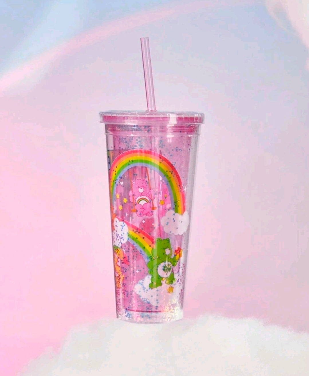 Glitter tumbler cup with straw and rainbow graphic, Care Bears positive vibes.