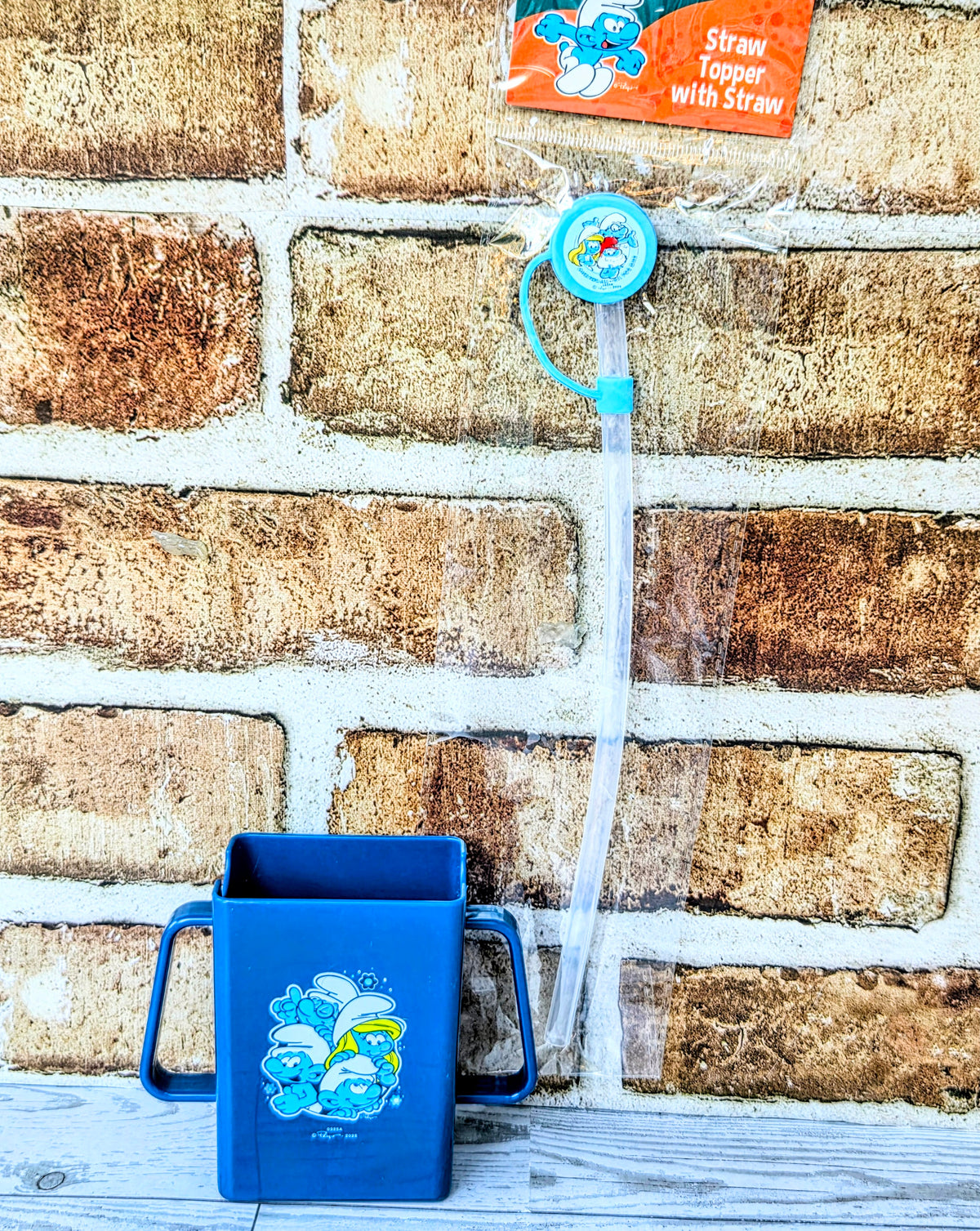 Smurfs straw with blue lid topper and matching juice box holder