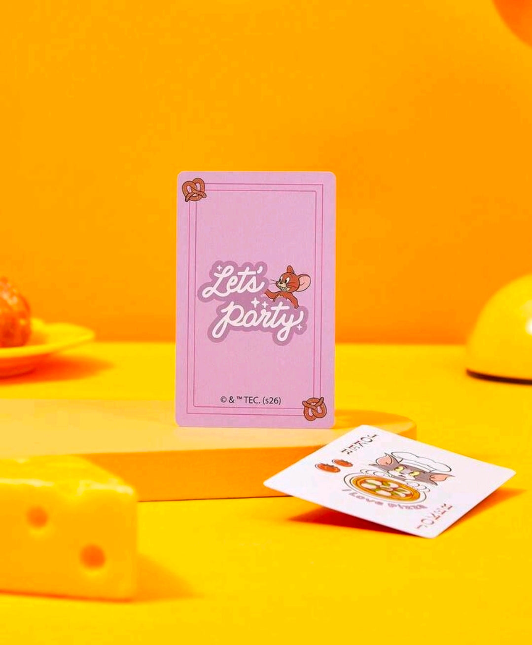 Tom & Jerry “Let’s Party” deck standing upright with cards laid nearby