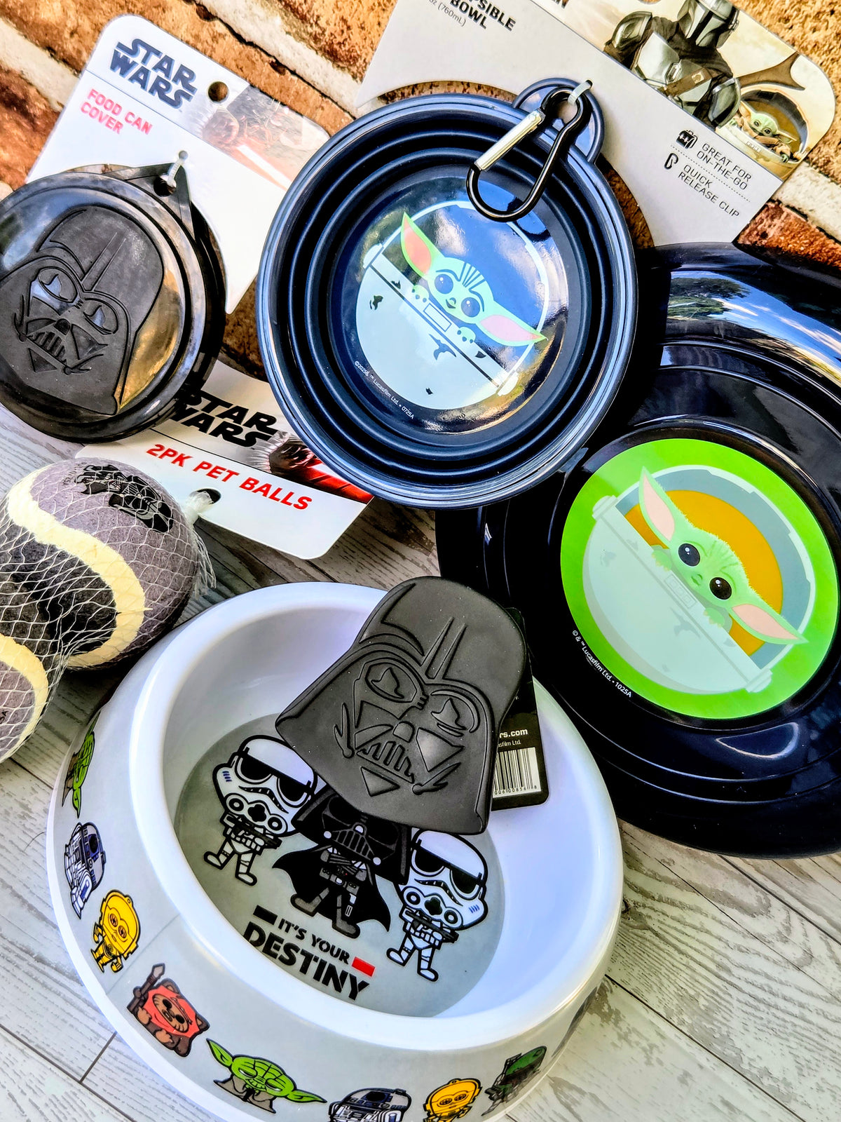 Star Wars pet bowls and Frisbee with Vader and Grogu designs and gray accessory balls