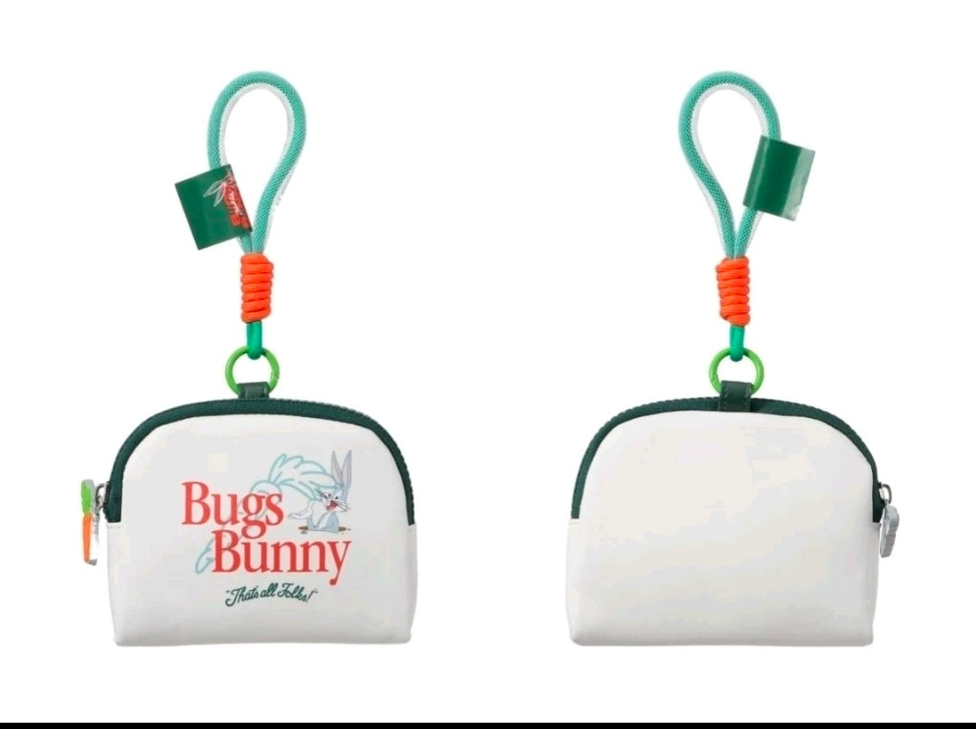 White coin purse keychain pouch with green trim and orange cord, Bugs Bunny logo front