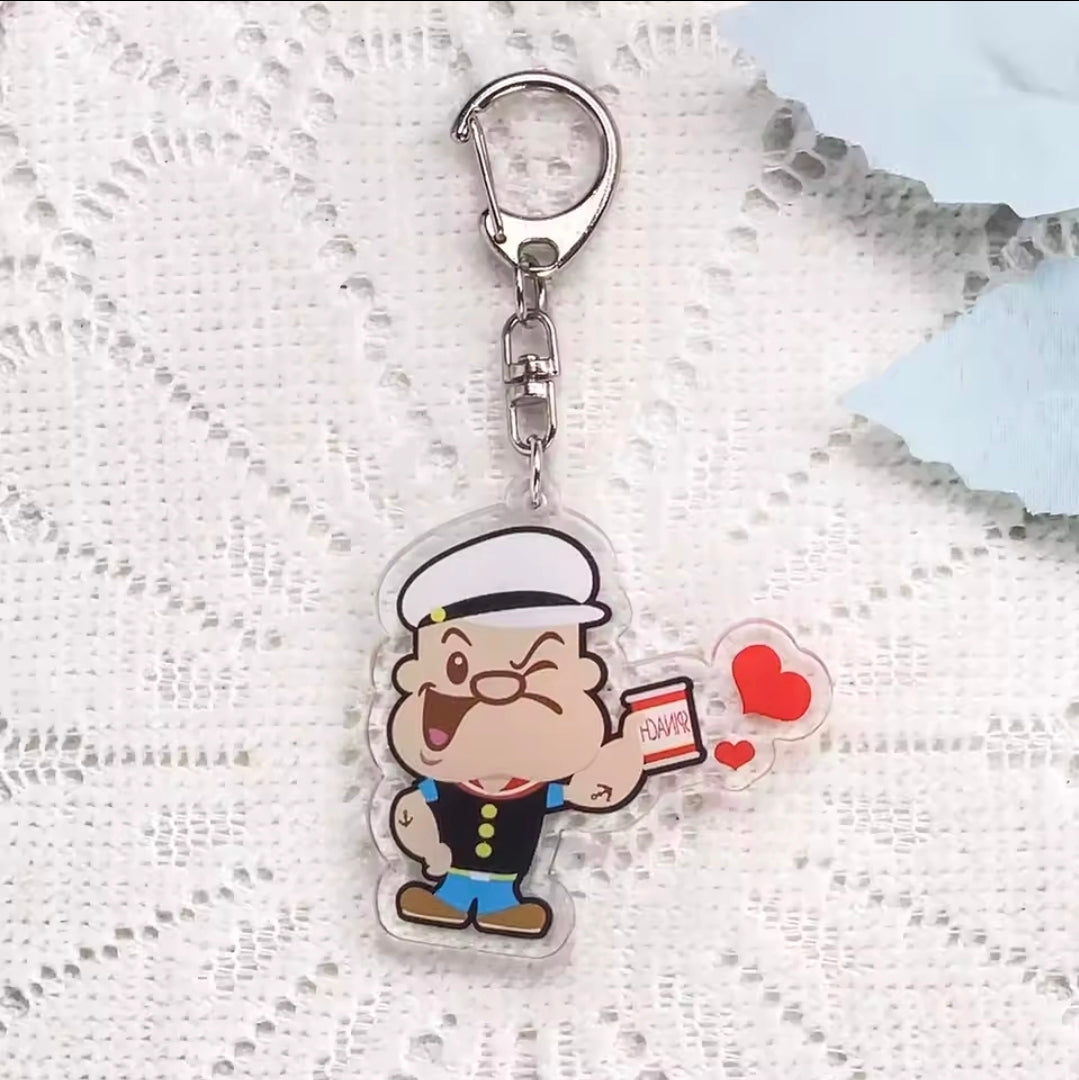 Set of 2 acrylic keychain charms: Popeye character holding red hearts