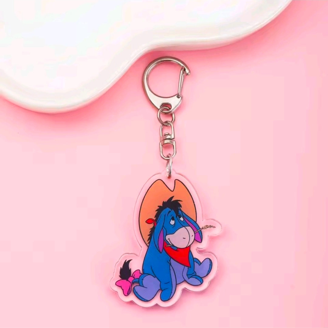 Acrylic Halloween keychain with carabiner; blue devil-style character charm with purple horns and heart.
